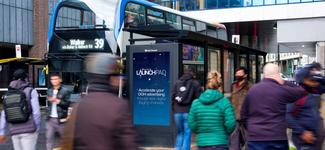 Shows an example of a Clear Channel display in a transit hub