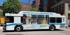 A bus showing an ad for Delta Dental on its side